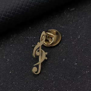 Pin muzieksleutels (goudkleurig)